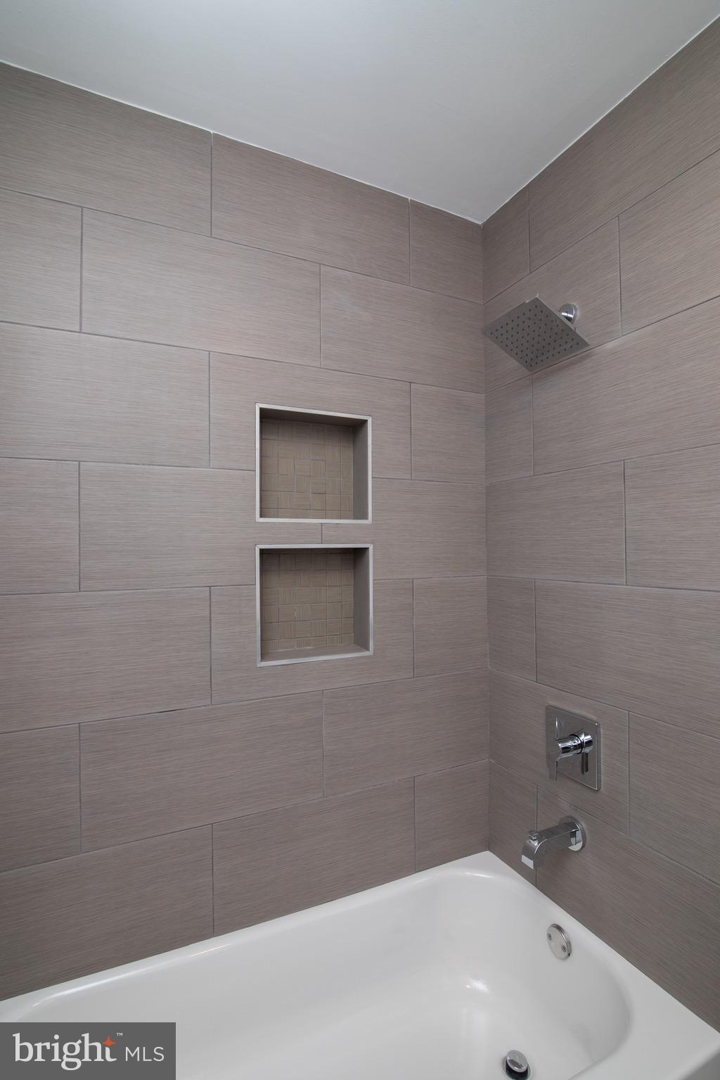 112 Country Club Road Pine Hill, NJ 08021 - Photo 11 of 22 a bathroom with a white bath tub and a shower