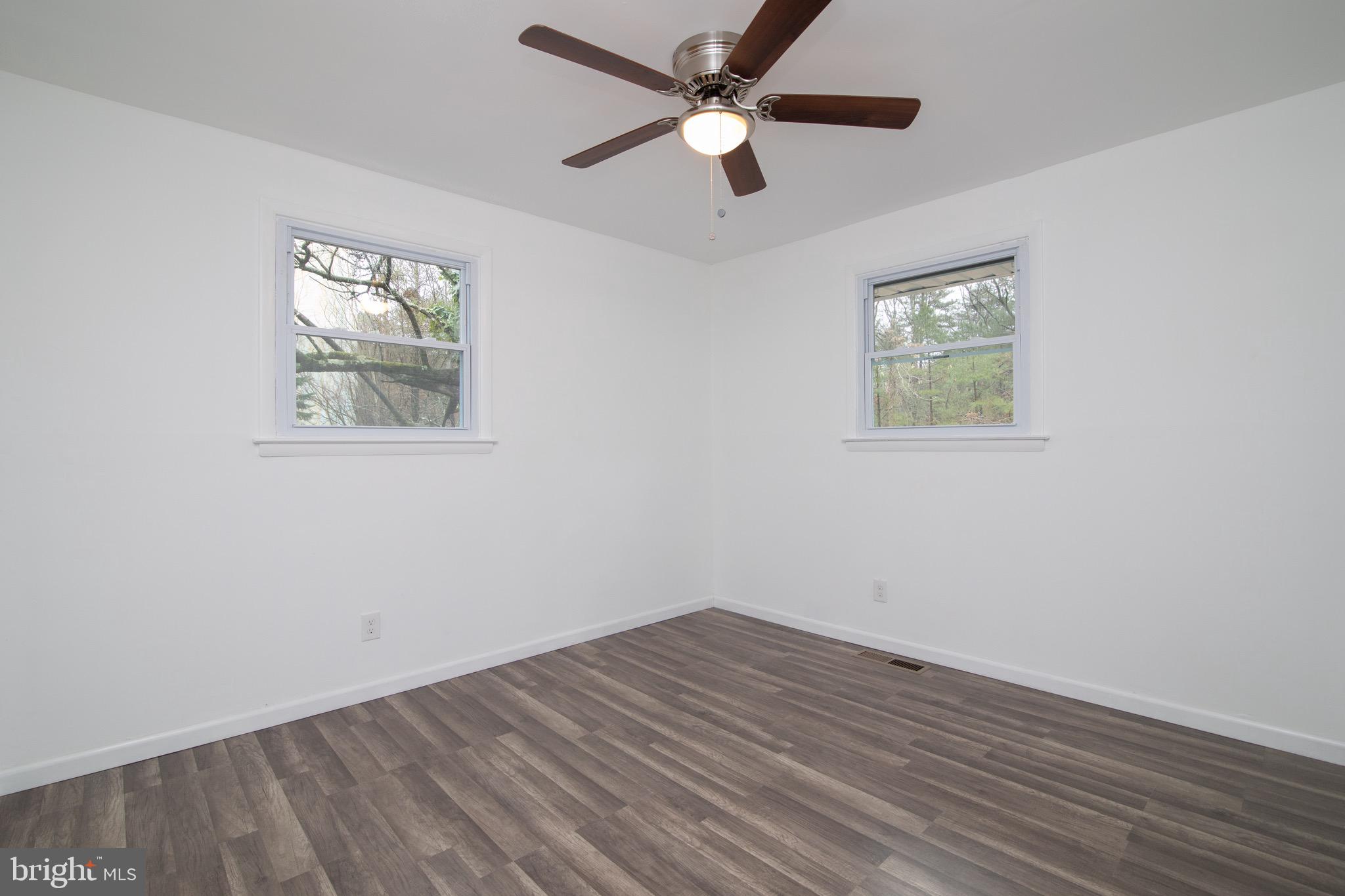 112 Country Club Road Pine Hill, NJ 08021 - Photo 16 of 22 a view of empty room with wooden floor