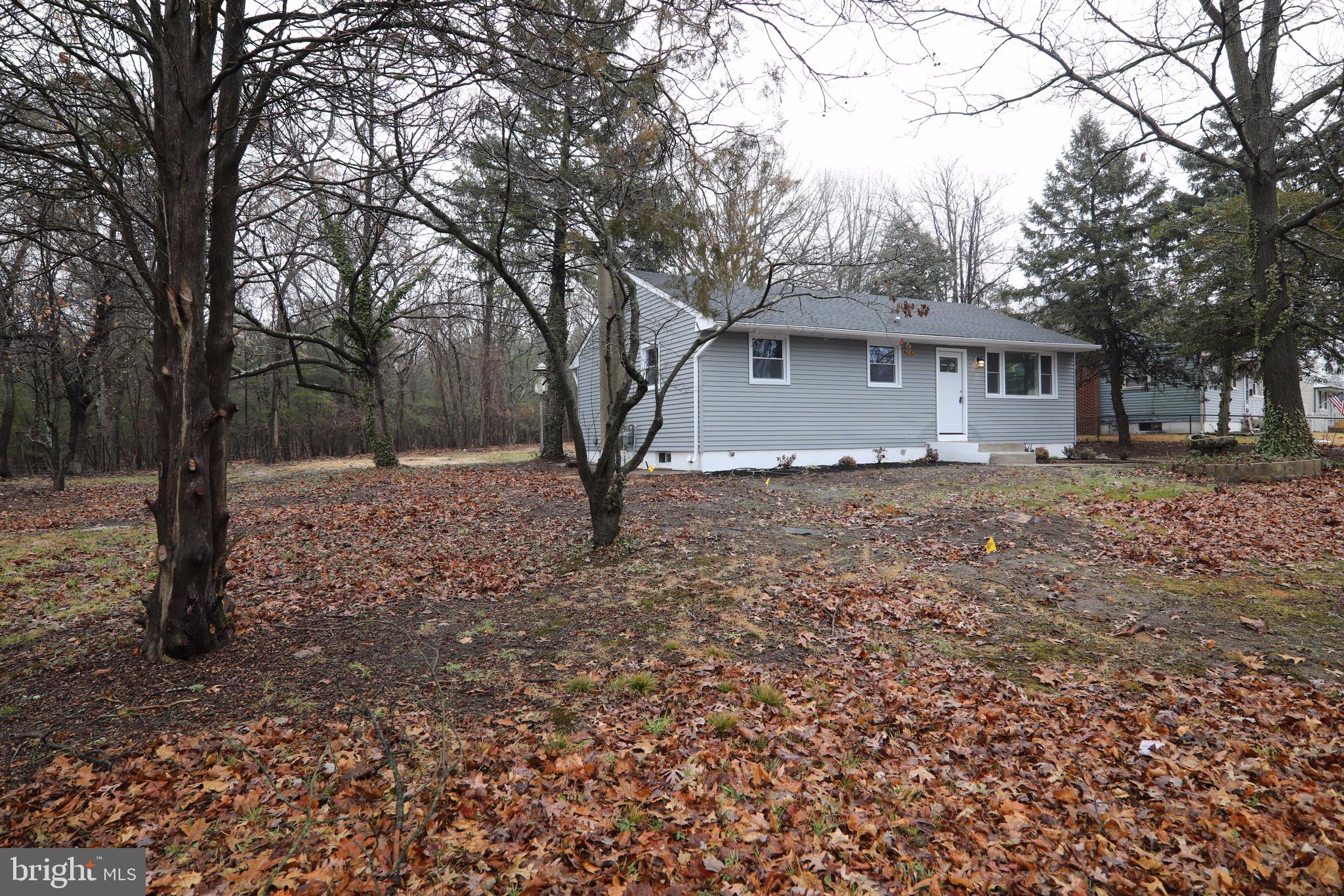 112 Country Club Road Pine Hill, NJ 08021 - Photo 22 of 22 a house that has a tree in front of it