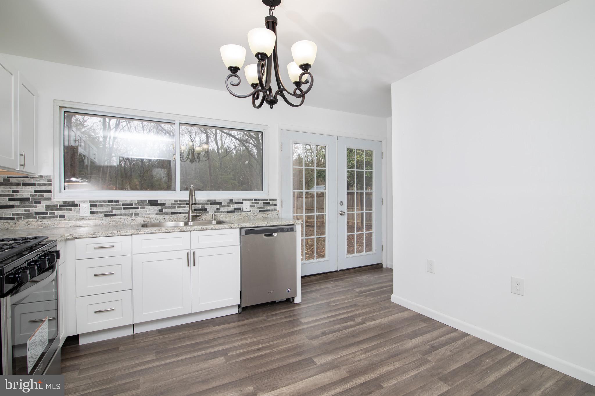 112 Country Club Road Pine Hill, NJ 08021 - Photo 5 of 22 a bathroom with a sink and a mirror