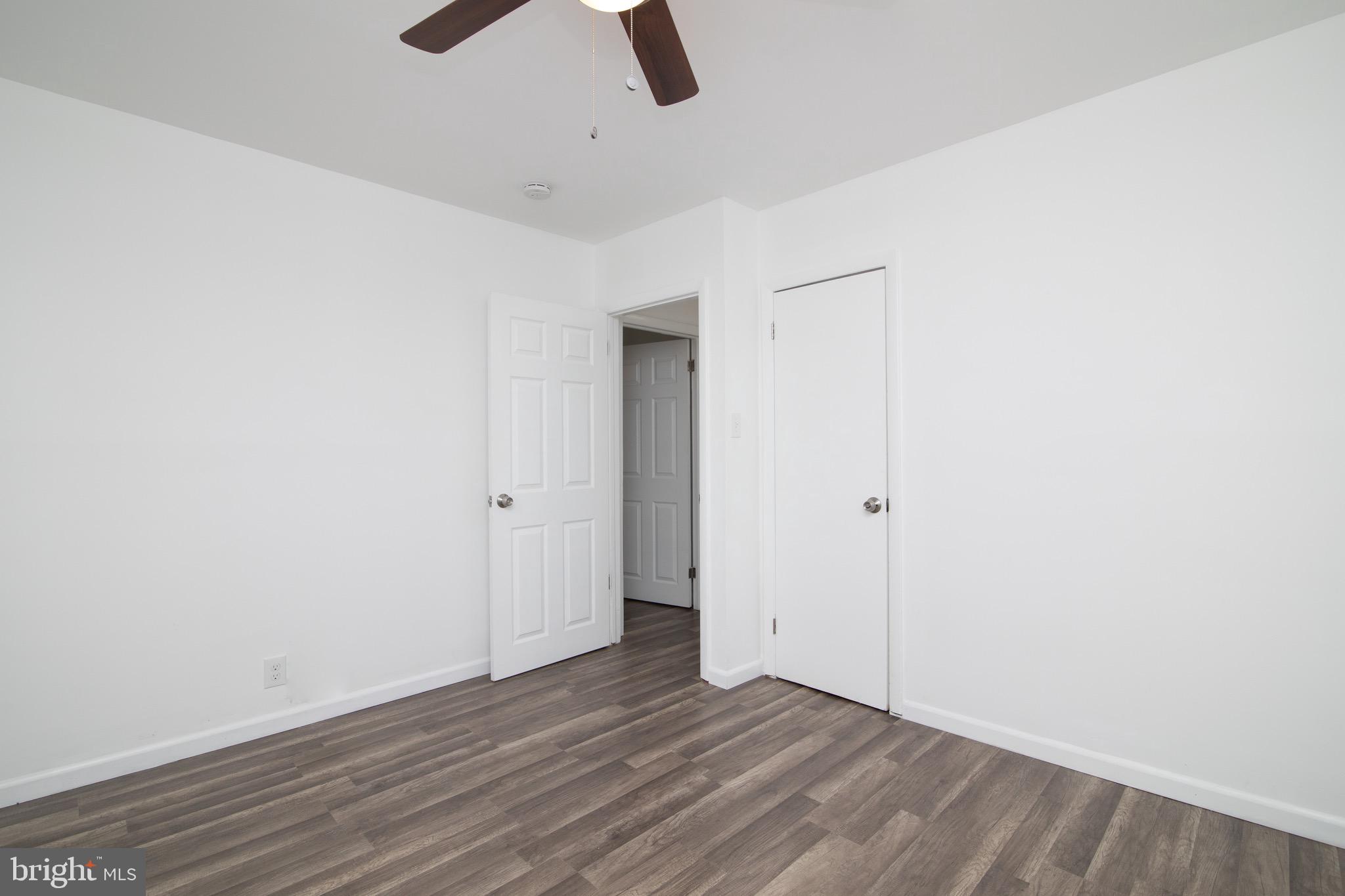 112 Country Club Road Pine Hill, NJ 08021 - Photo 8 of 22 wooden floor in an empty room