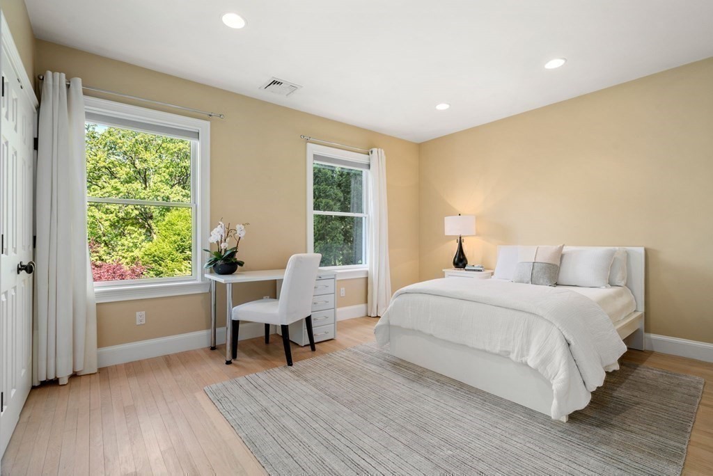82 Sargent Road Brookline, MA 02445 - Photo 29 of 41 a bedroom with a bed and a desk