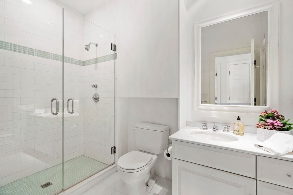 82 Sargent Road Brookline, MA 02445 - Photo 30 of 41 a bathroom with a sink toilet and shower