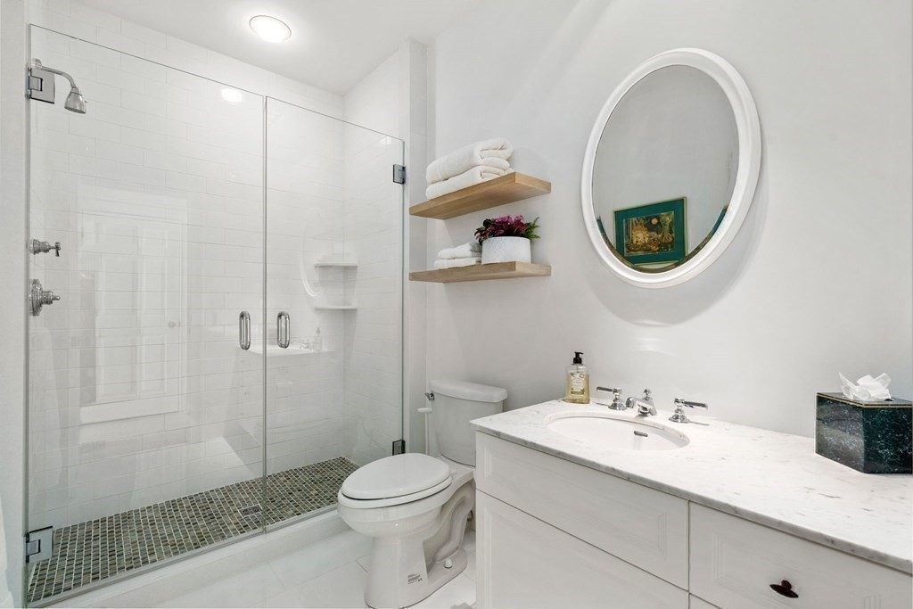 82 Sargent Road Brookline, MA 02445 - Photo 31 of 41 a bathroom with a sink a toilet and shower