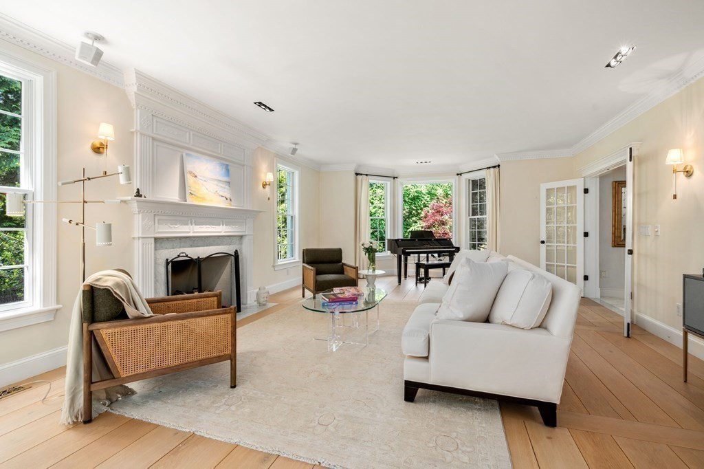 82 Sargent Road Brookline, MA 02445 - Photo 7 of 41 a living room with furniture and a fireplace