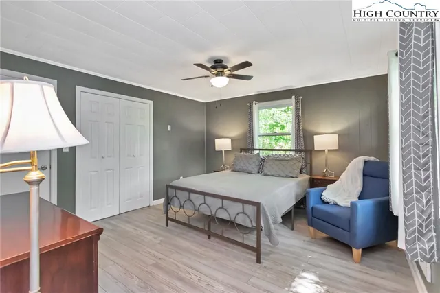 a room with furniture and a chandelier