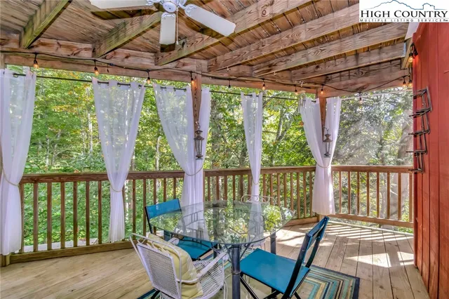 a living room with large windows