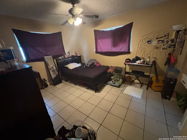 a room with furniture and a lamp