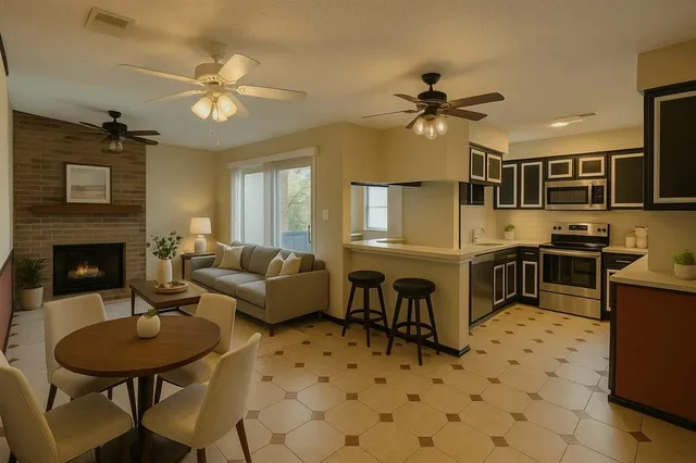 a living room with furniture a dining table and kitchen view
