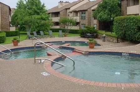 a view of a house with a yard porch and sitting area