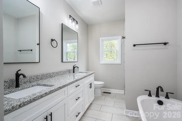 a bathroom with a sink and a toilet
