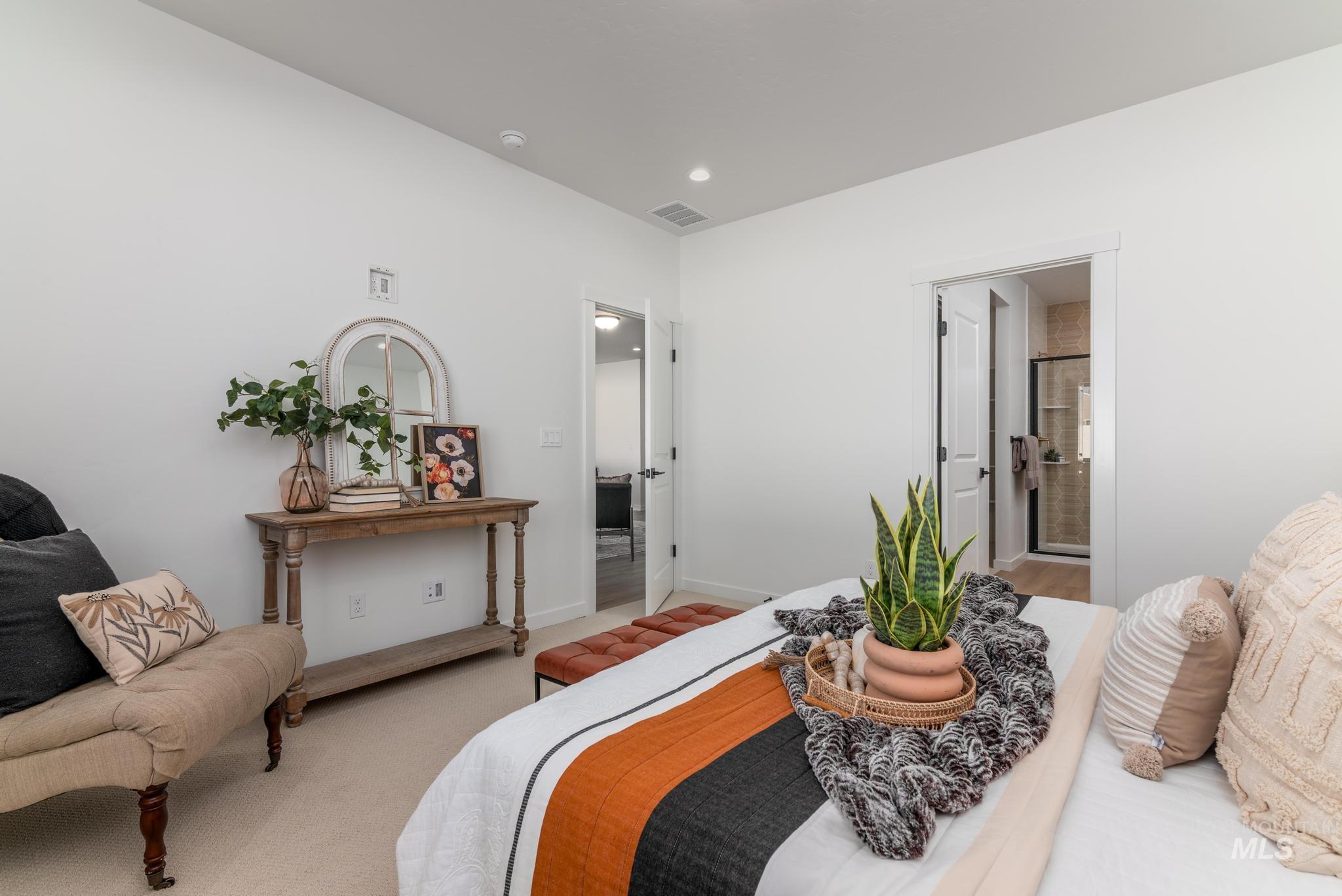 14803 Wing Spread Drive Caldwell, ID 83607 - Photo 6 of 8 Bedroom featuring ensuite bath, recessed lighting, and carpet