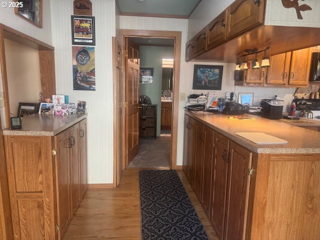 1911 15th Street Baker City, OR 97814 - Photo 15 of 33 a kitchen with a refrigerator and a sink