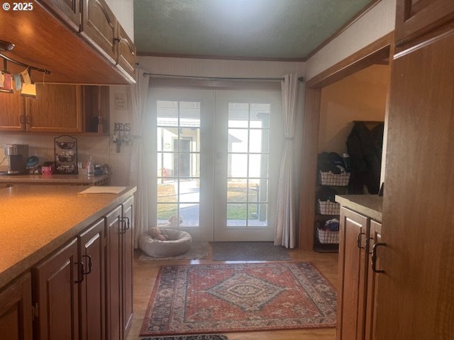 1911 15th Street Baker City, OR 97814 - Photo 21 of 33 a kitchen with a sink a stove and a refrigerator