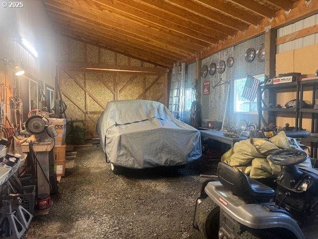 1911 15th Street Baker City, OR 97814 - Photo 25 of 33 a living room with furniture and a flat screen tv