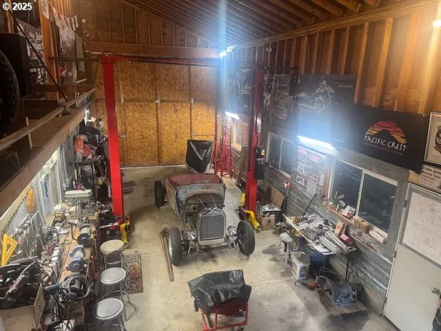 a gym room with lots of clutter and chairs