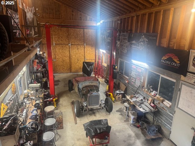 1911 15th Street Baker City, OR 97814 - Photo 27 of 33 a gym room with lots of clutter and chairs