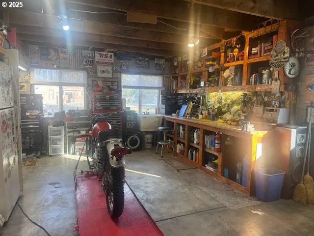 a front view of a house with parking area