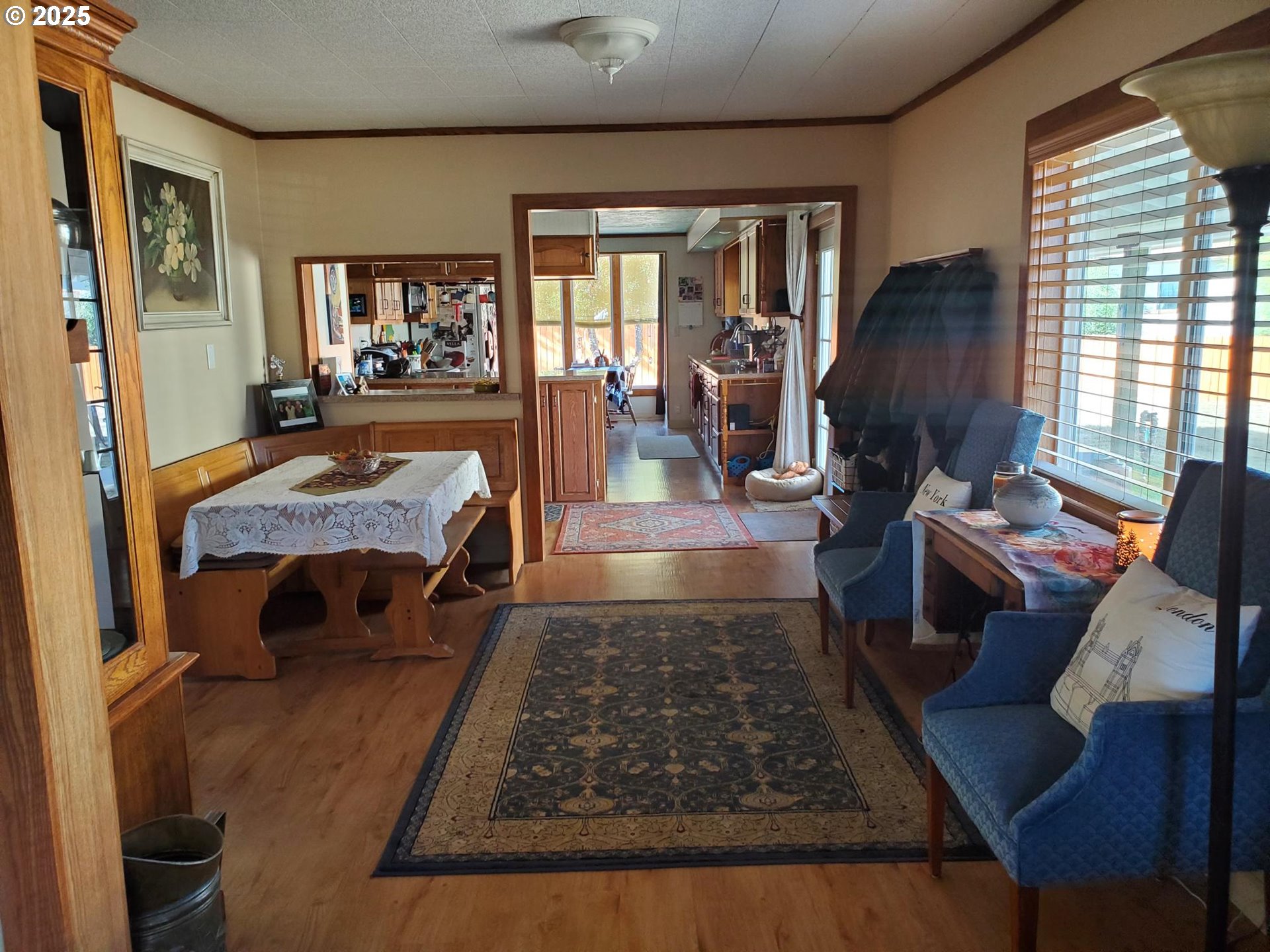 1911 15th Street Baker City, OR 97814 - Photo 8 of 33 a living room with furniture and a wooden floor