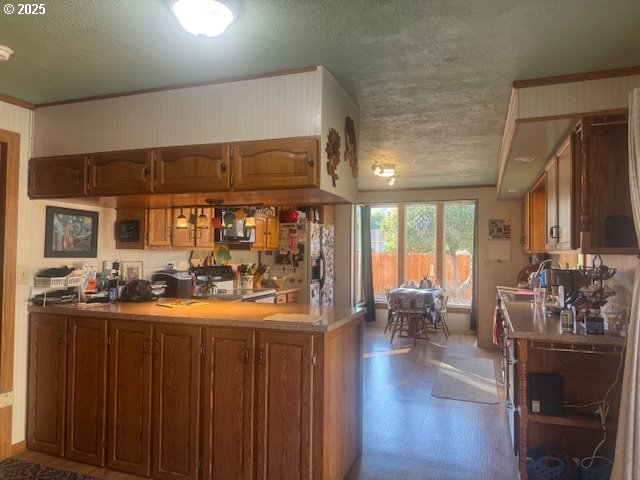1911 15th Street Baker City, OR 97814 - Photo 10 of 33 a view of a dining room with furniture window and wooden floor