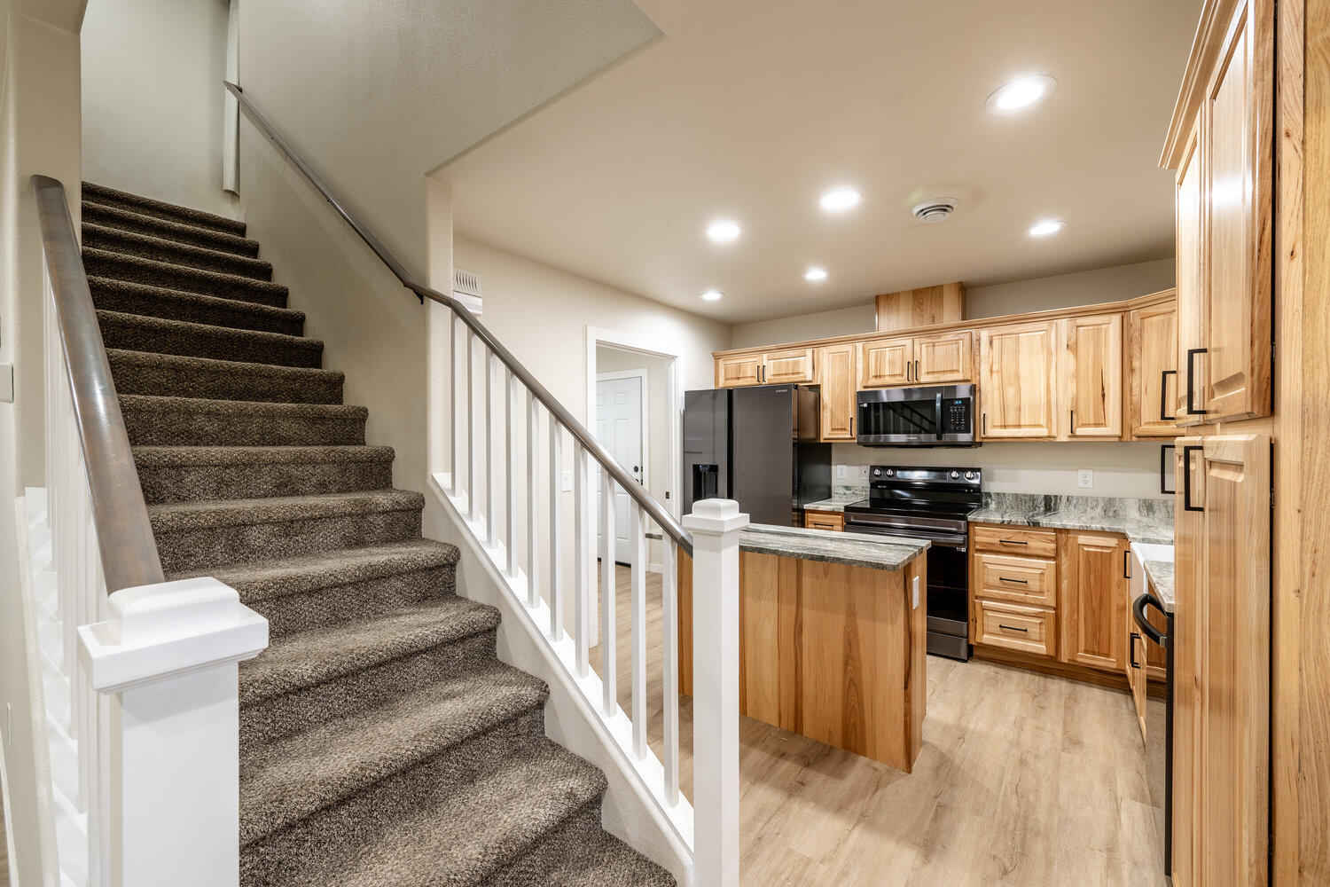 1165 Covey Run Road Sheridan, WY 82801 - Photo 7 of 18 Stairs Kitchen