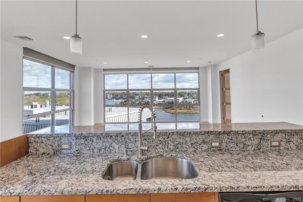 33 North Water Street, Unit 607 Norwalk, CT 06854 - Photo 11 of 40 a kitchen with sink and window