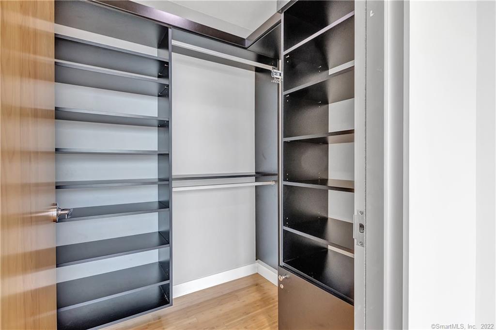 33 North Water Street, Unit 607 Norwalk, CT 06854 - Photo 17 of 40 a view of walk in closet with empty racks