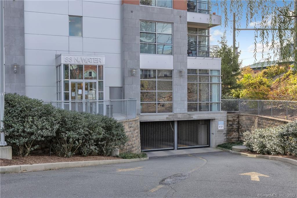 33 North Water Street, Unit 607 Norwalk, CT 06854 - Photo 27 of 40 front view of a building with a street