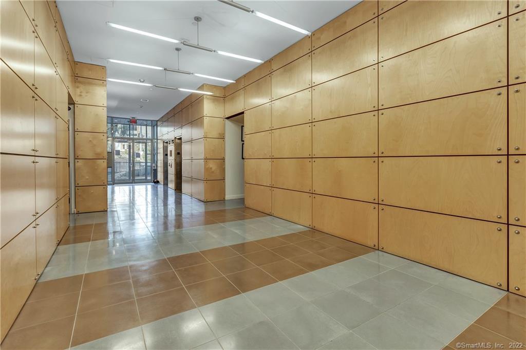 33 North Water Street, Unit 607 Norwalk, CT 06854 - Photo 32 of 40 a view of a utility room with lots of a shower