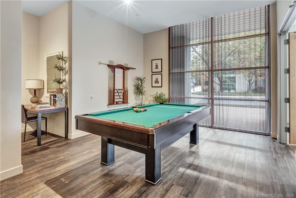 33 North Water Street, Unit 607 Norwalk, CT 06854 - Photo 34 of 40 a room with pool table and windows