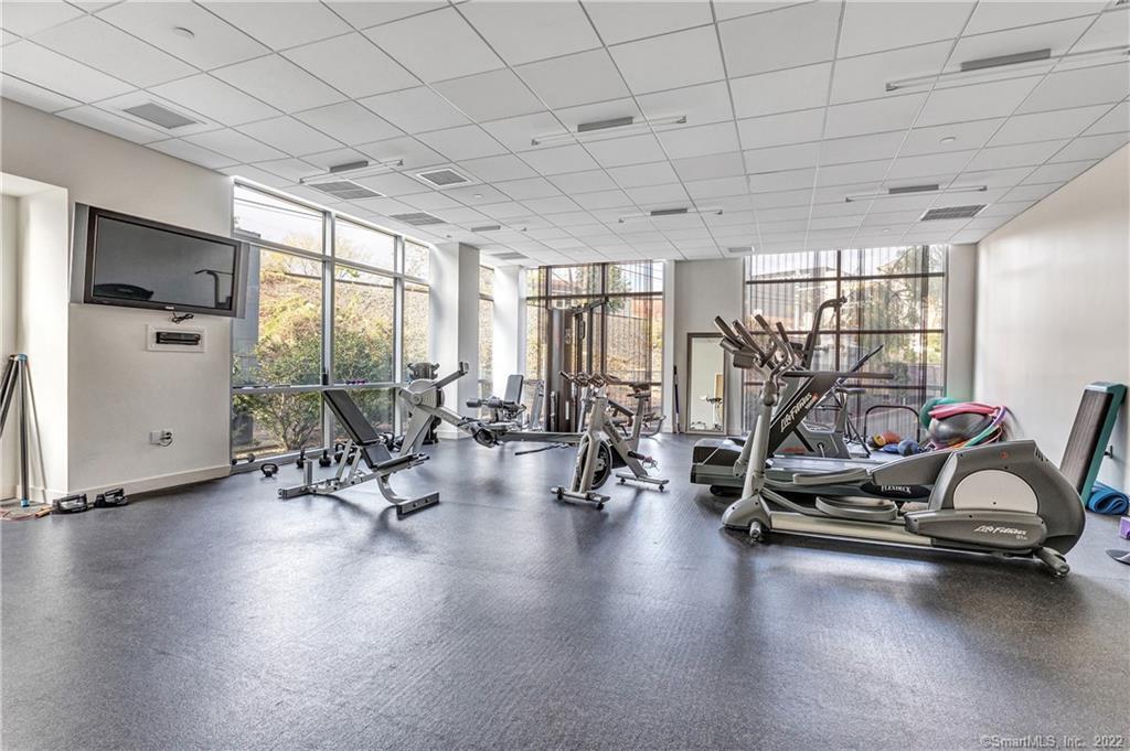 33 North Water Street, Unit 607 Norwalk, CT 06854 - Photo 37 of 40 a view of a room with gym equipment