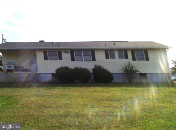 1216 Random Ridge Road Westminster, MD 21157 - Photo 1 of 6 a house view with swimming pool in front of it