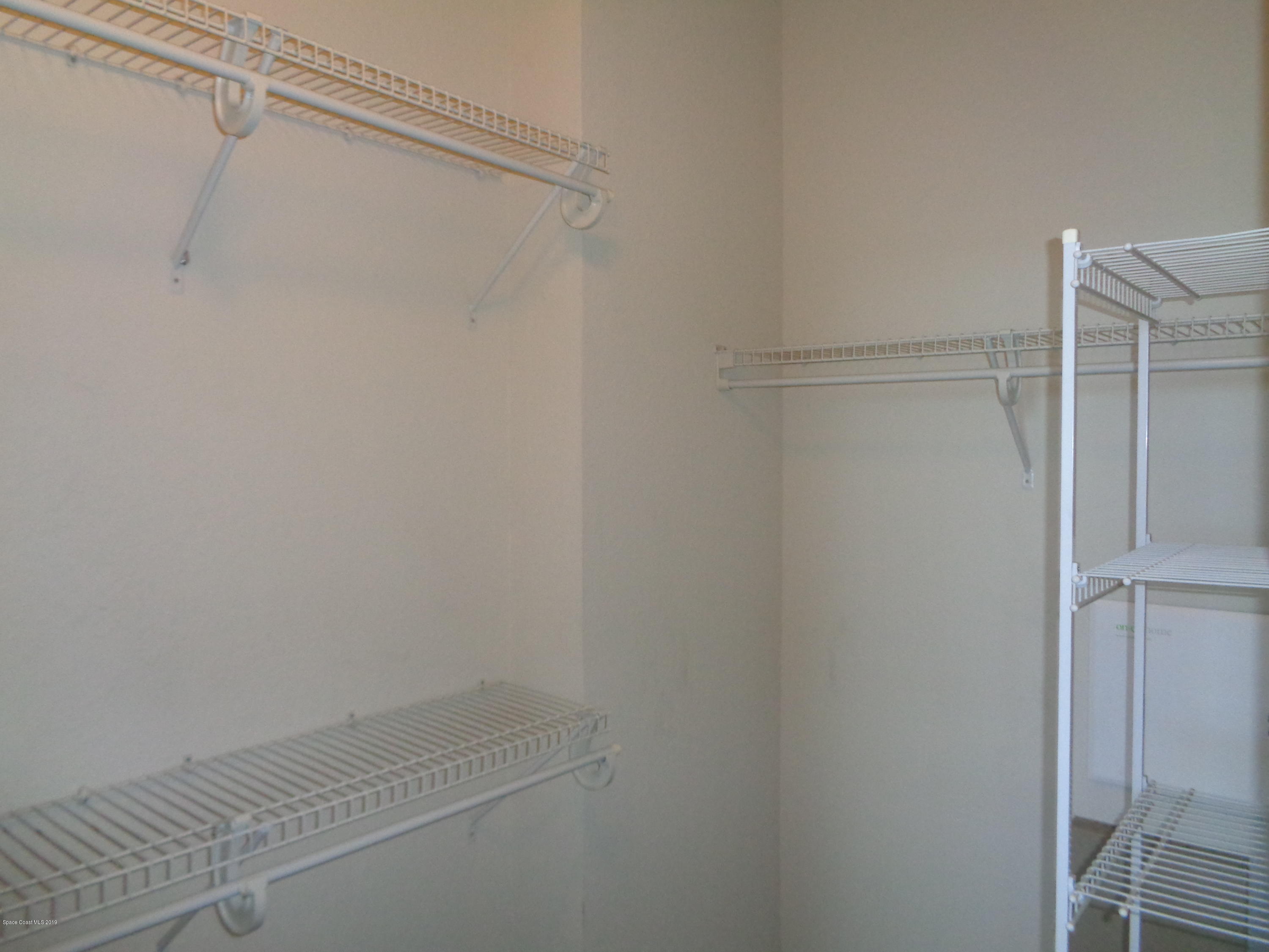 3848 Lexmark Lane, Unit 406 Rockledge, FL 32955 - Photo 7 of 17 Walk-in Closet