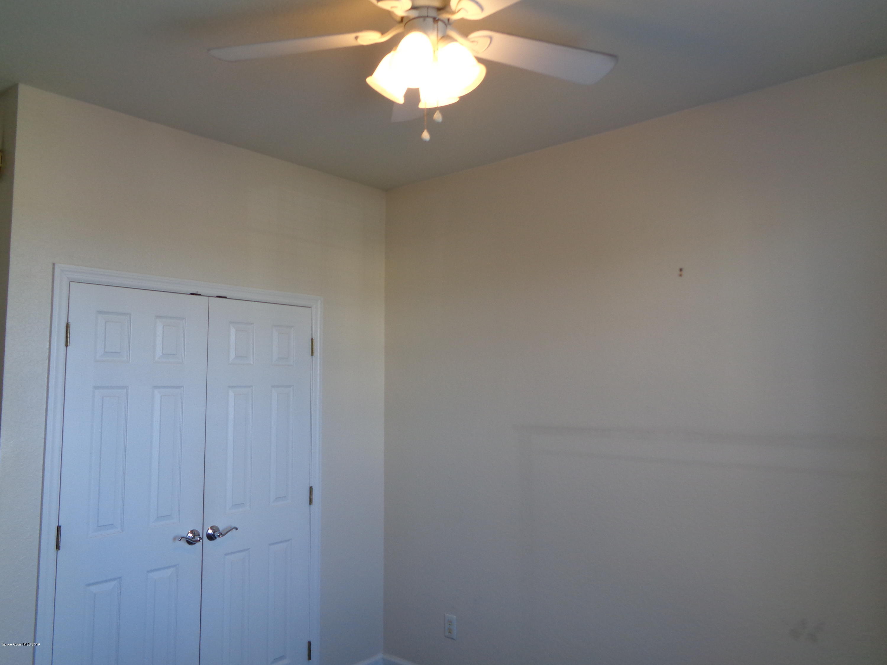3848 Lexmark Lane, Unit 406 Rockledge, FL 32955 - Photo 8 of 17 Bedroom 1 Tile