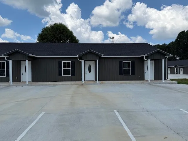 an empty room with closet area