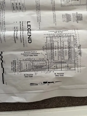 a kitchen with stainless steel appliances a stove a microwave and sink