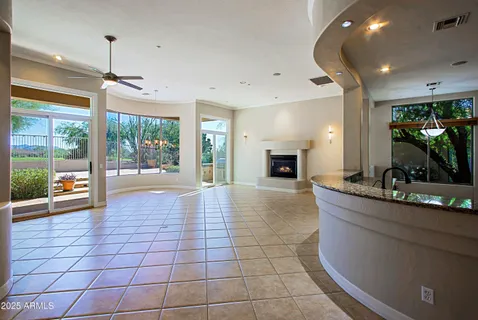 a view of a hallway with wooden shelves