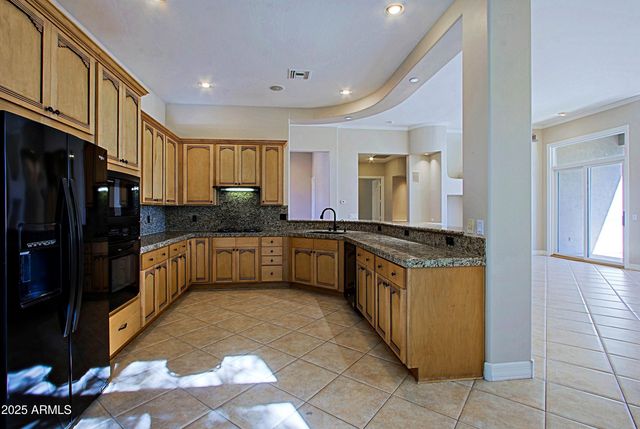 a view of room with window and hardwood floor