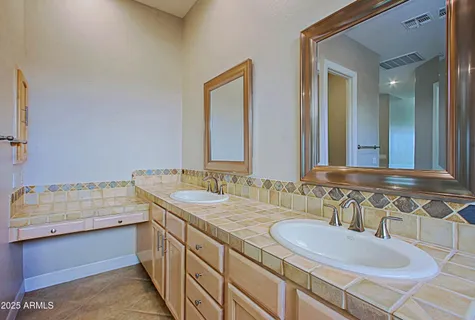 an aerial view of residential houses and outdoor space