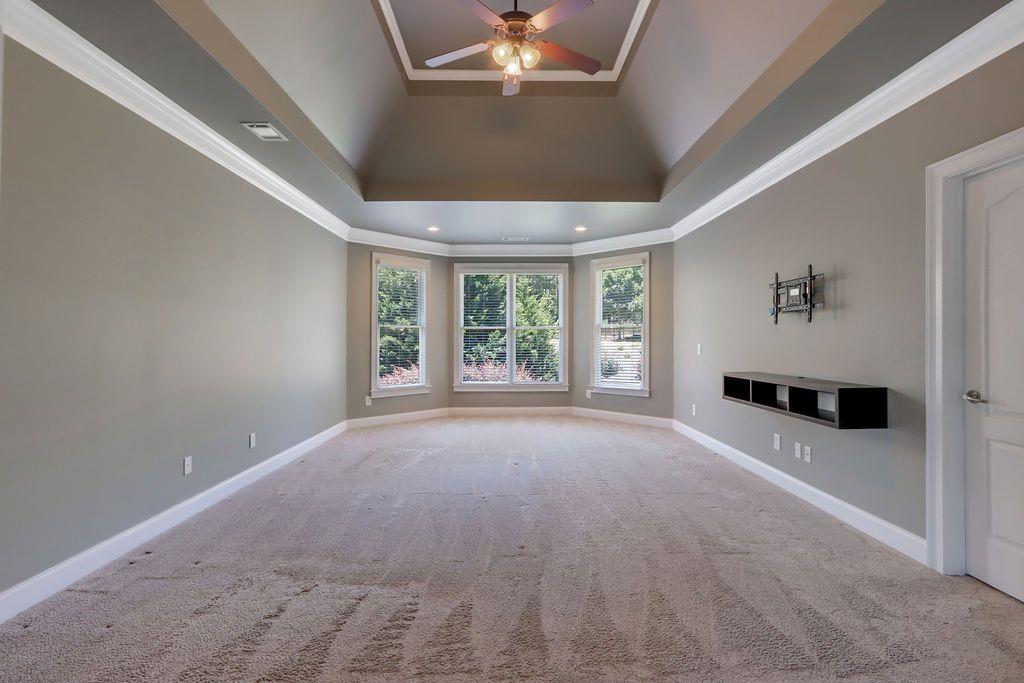 4174 Highglen Trace Northeast Dacula, GA 30019 - Photo 25 of 48 a view of an empty room with a window