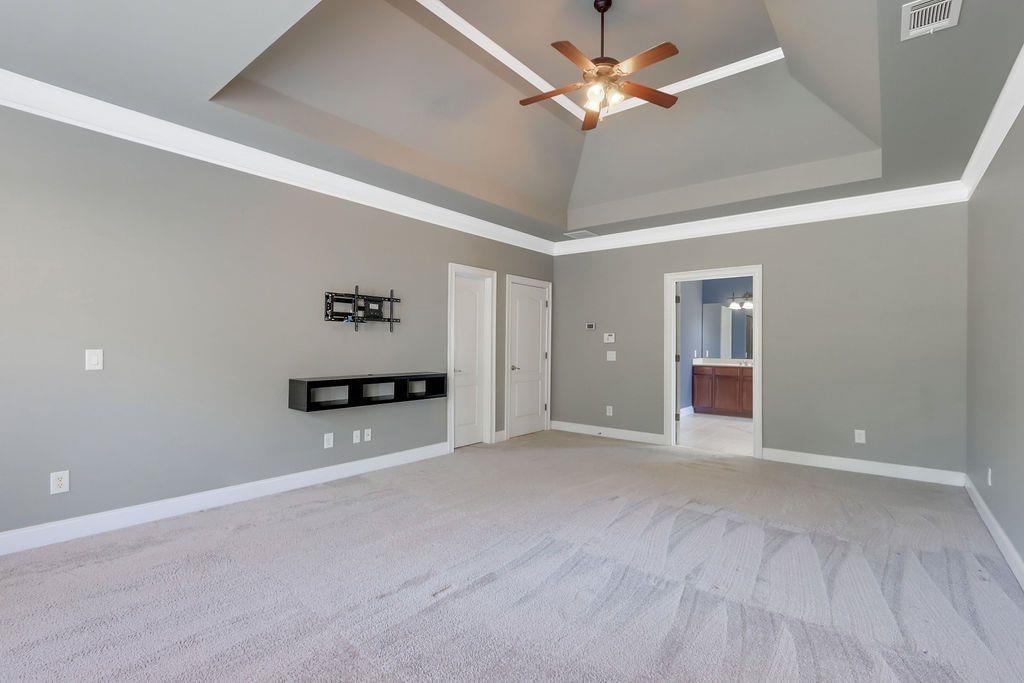 4174 Highglen Trace Northeast Dacula, GA 30019 - Photo 26 of 48 wooden floor in an empty room with a window