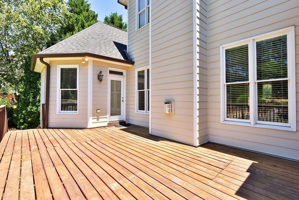 4174 Highglen Trace Northeast Dacula, GA 30019 - Photo 43 of 48 a view of a house with a backyard