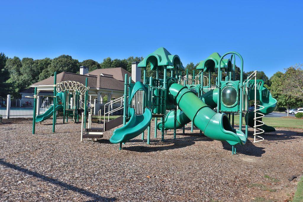 4174 Highglen Trace Northeast Dacula, GA 30019 - Photo 48 of 48 a view of a park with swings