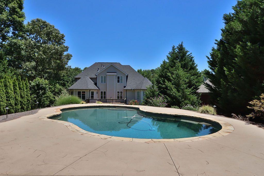4174 Highglen Trace Northeast Dacula, GA 30019 - Photo 5 of 48 a view of pool with a small yard