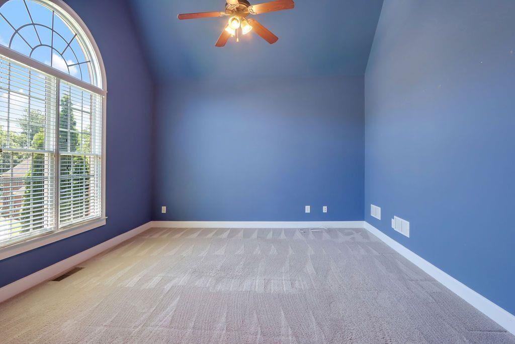 4174 Highglen Trace Northeast Dacula, GA 30019 - Photo 8 of 48 a view of an empty room with a window