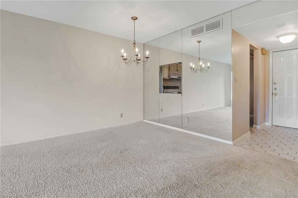 9 High Point Circle North, Unit 106 Naples, FL 34103 - Photo 11 of 35 dining room