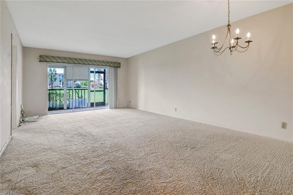 9 High Point Circle North, Unit 106 Naples, FL 34103 - Photo 12 of 35 Great views of golf course from living/dining room