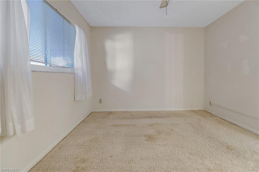 9 High Point Circle North, Unit 106 Naples, FL 34103 - Photo 26 of 35 Guest bedroom