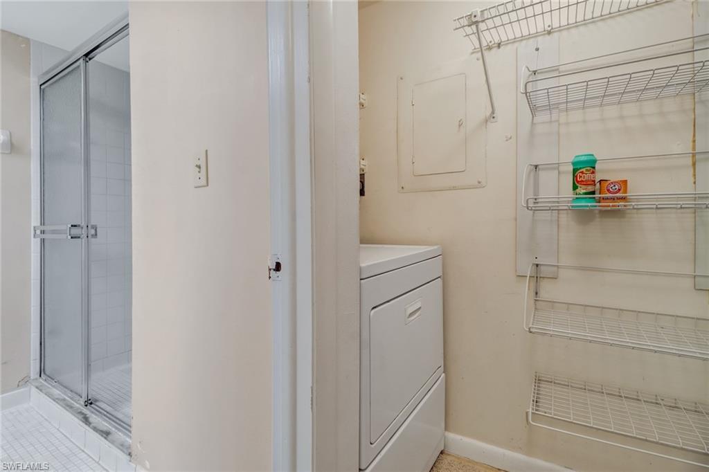 9 High Point Circle North, Unit 106 Naples, FL 34103 - Photo 27 of 35 Laundry in the condo
