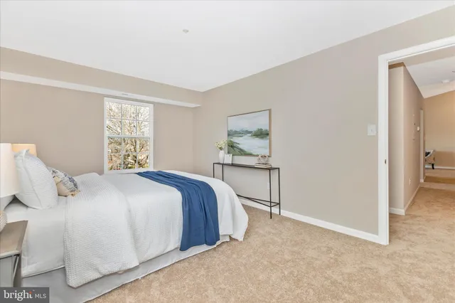 a bathroom with a sink toilet and a mirror